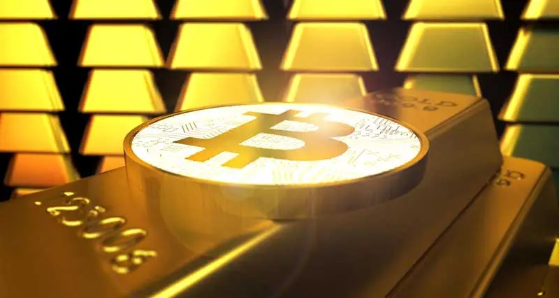 Goldbarren und Bitcoin-Münze