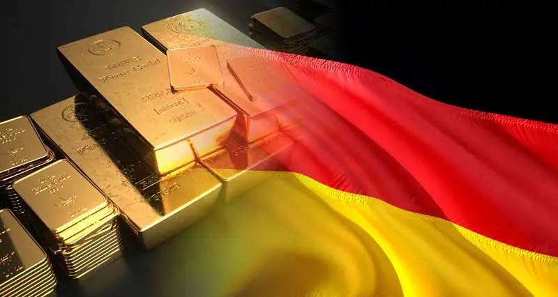 Goldbarren und Deutschlandfahne